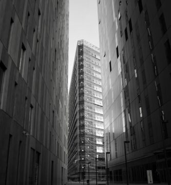 grayscale photo of high rise building